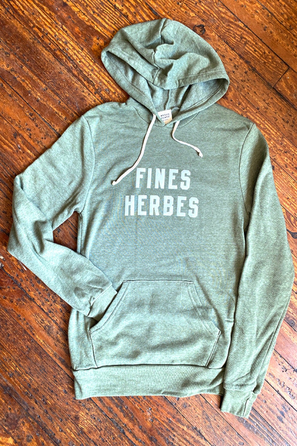 Fines Herbes Eco Fleece Hoodie Sweatshirt in Sage Green. Made in Atlanta, ethically and sustainably, by slow fashion designer Megan Huntz. 