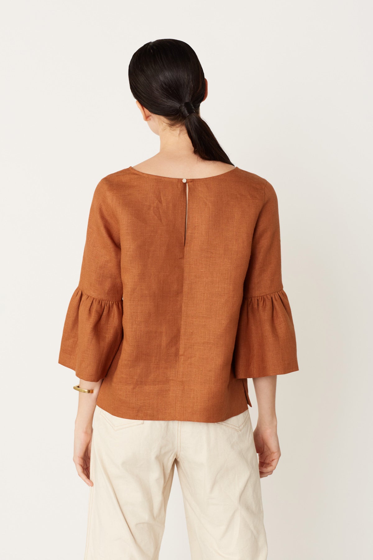 Valentina Top with Ruffle Sleeve in Ocre Linen. Made in Atlanta, ethically and sustainably, by slow fashion designer Megan Huntz. 