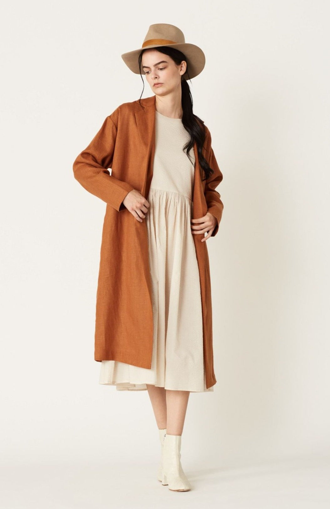 Ms. Rosalee Linen Long Sleeve Coat in Ocre Linen. Made in Atlanta, ethically and sustainably, by slow fashion designer Megan Huntz. 