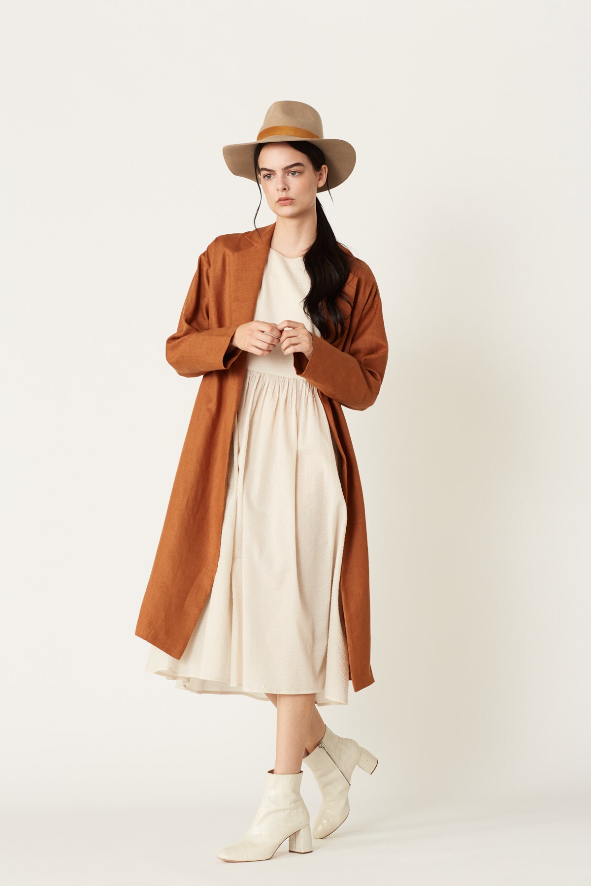Ms. Rosalee Linen Long Sleeve Coat in Ocre Linen. Made in Atlanta, ethically and sustainably, by slow fashion designer Megan Huntz. 