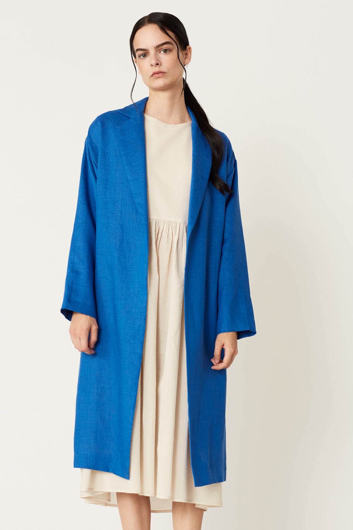 Ms. Rosalee Linen Long Sleeve Coat in Azure Linen. Made in Atlanta, ethically and sustainably, by slow fashion designer Megan Huntz. 