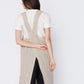 Linen Pinafore Apron in Natural. Made in Atlanta, ethically and sustainably, by slow fashion designer Megan Huntz. 